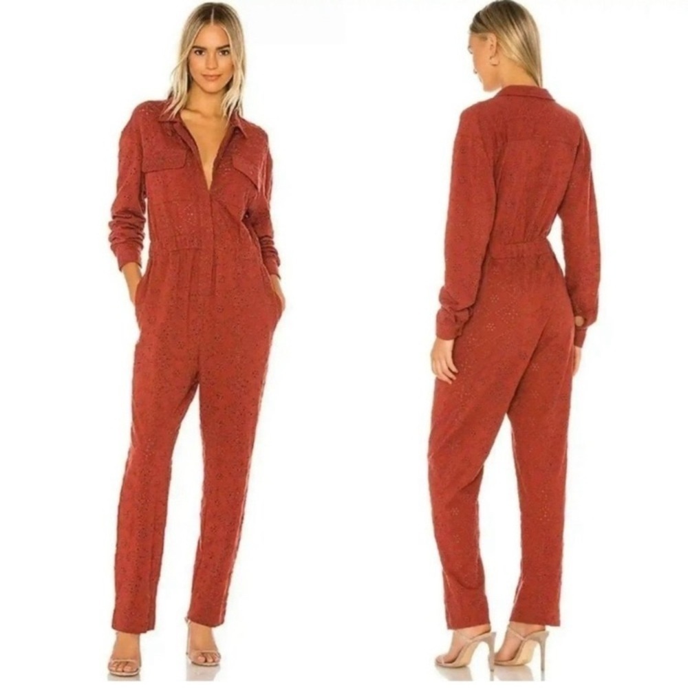 Free People rust colored eyelet jumpsuit zip up size 4